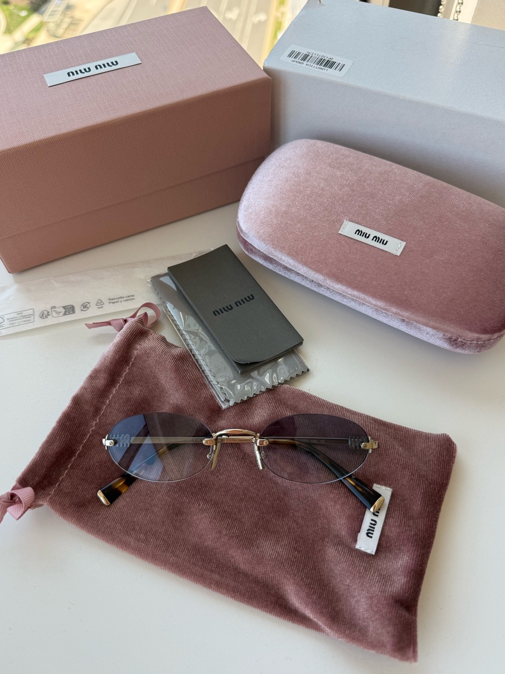 Miu Miu oval sunglasses